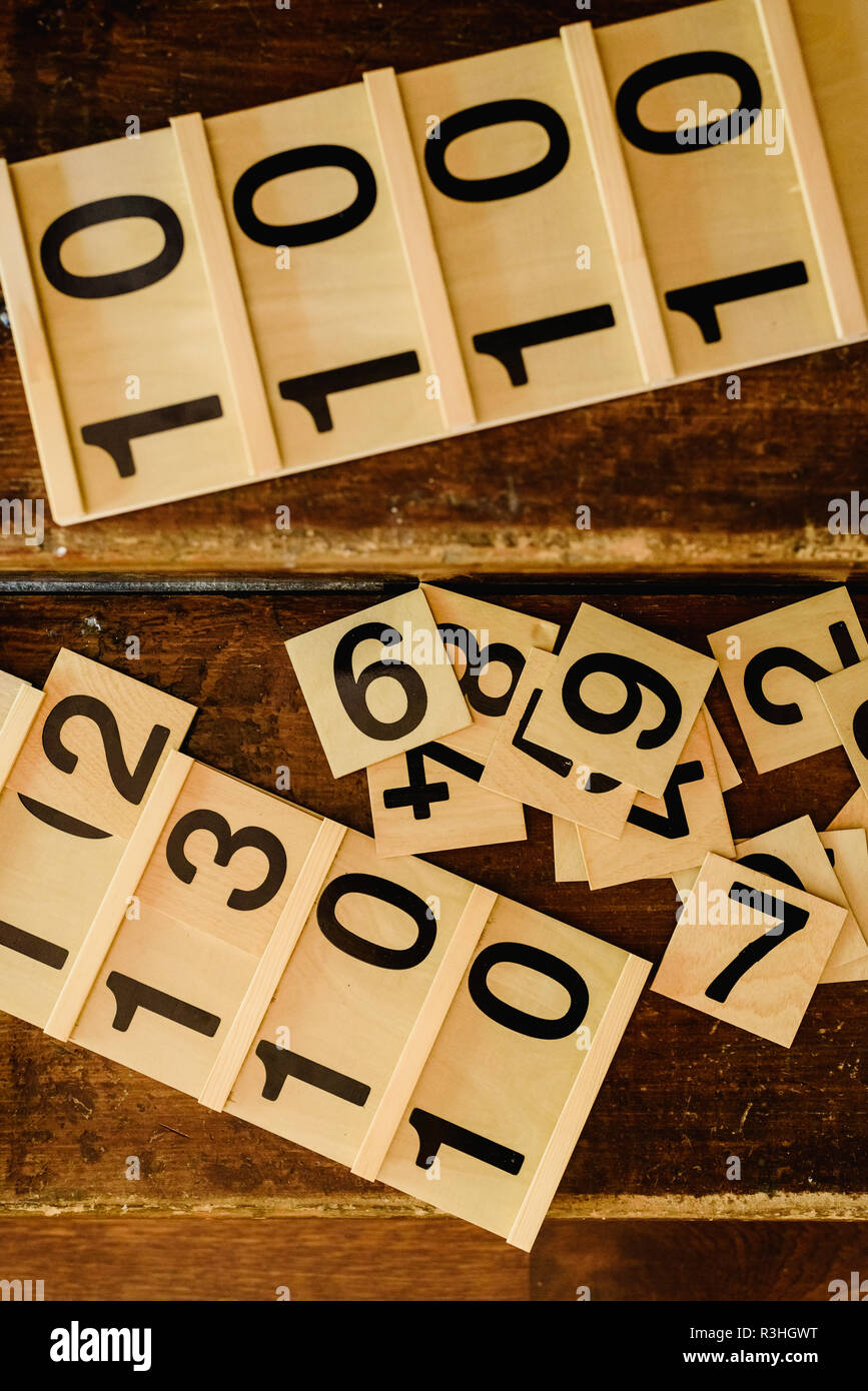 Table Learning Number Wooden numbers in tables to learn mathematics in a Montessori classroom ...