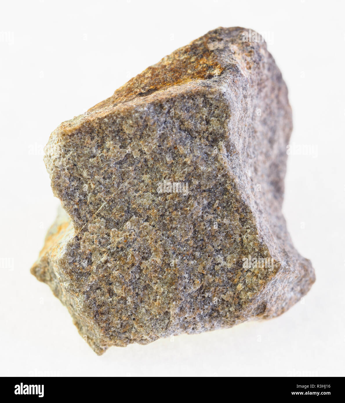 macro photography of natural mineral from geological collection - raw Quartzite stone on white background Stock Photo
