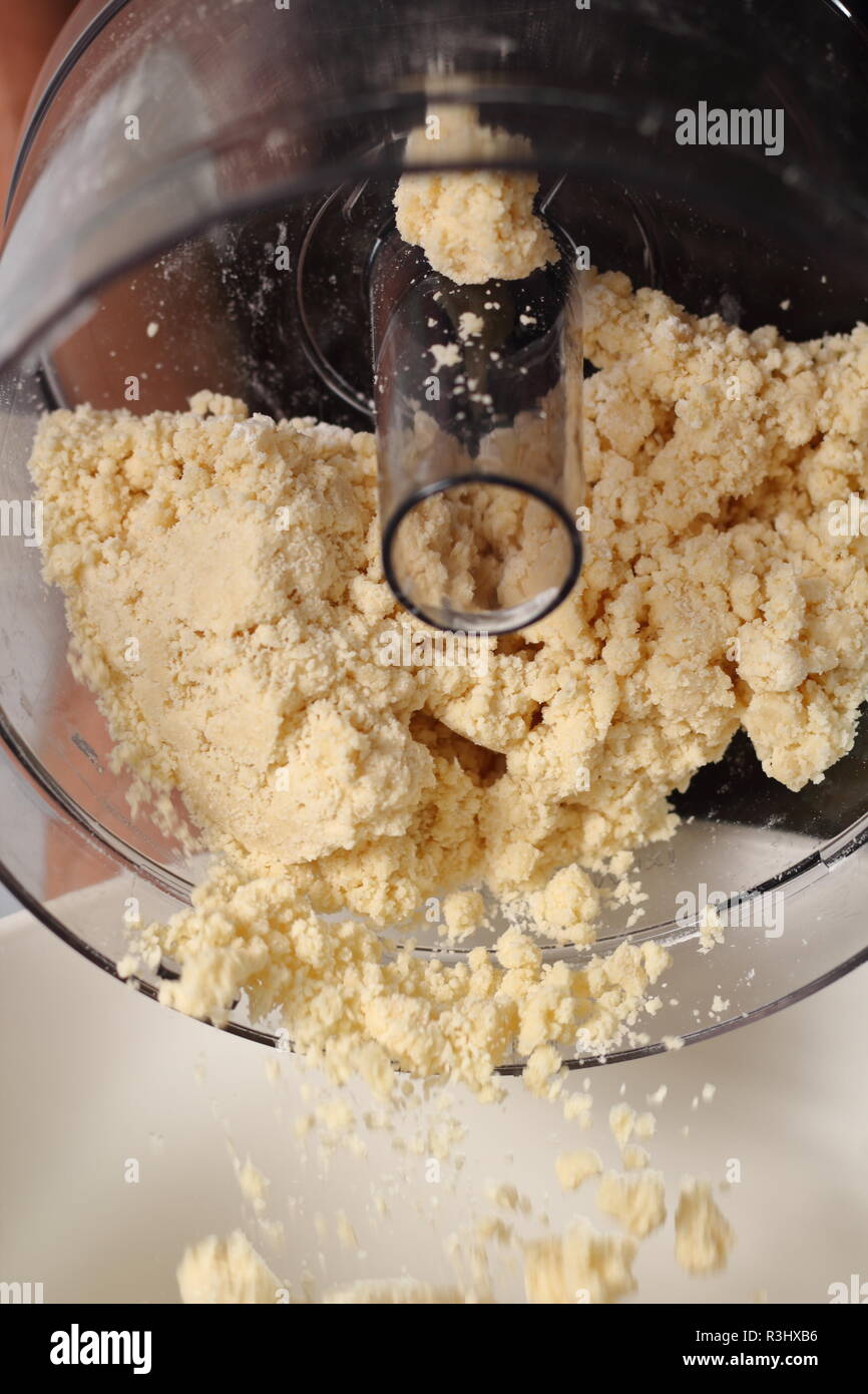 Transfer shortcrust pastry dough from mixer to bowl. Making Shoofly