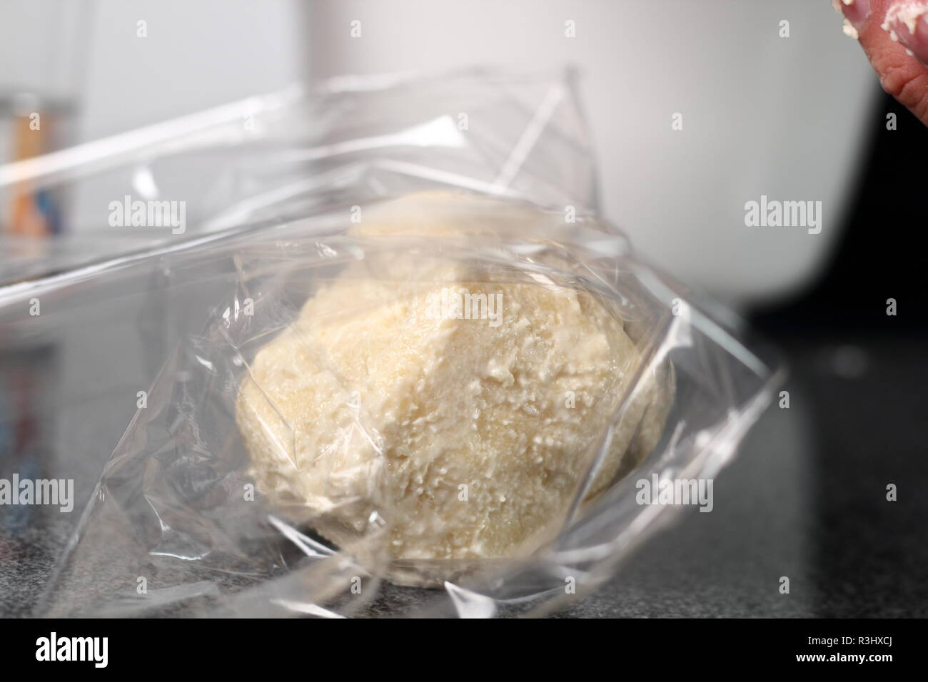 Wrap dough ball in plastic film. Making Shoofly Tart Series Stock Photo