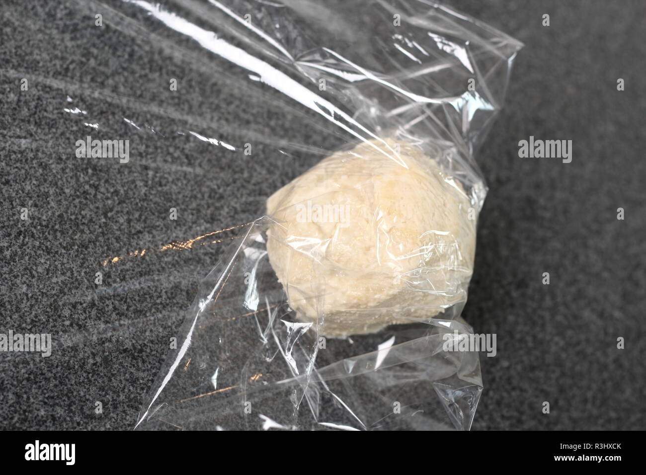 Wrap dough ball in plastic film. Making Shoofly Tart Series Stock Photo