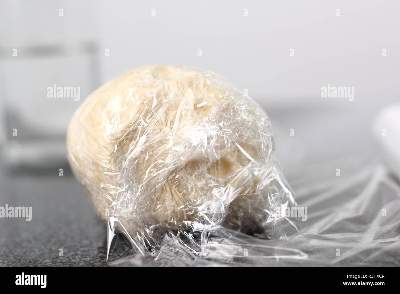 Wrap dough ball in plastic film. Making Shoofly Tart Series Stock Photo
