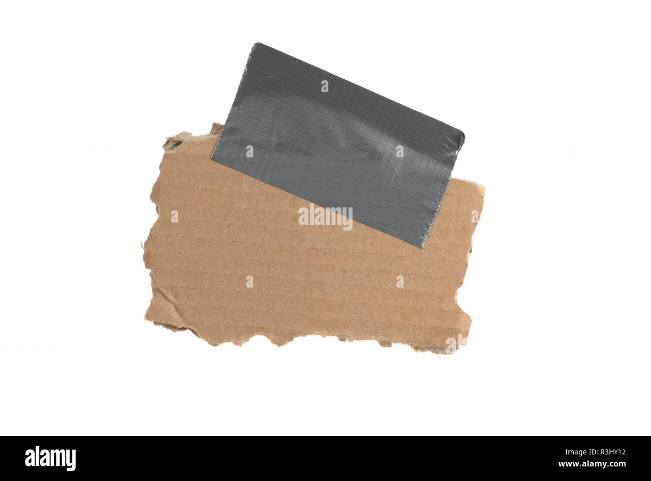 isolated old cardboard with adhesive tape and copy space Stock Photo