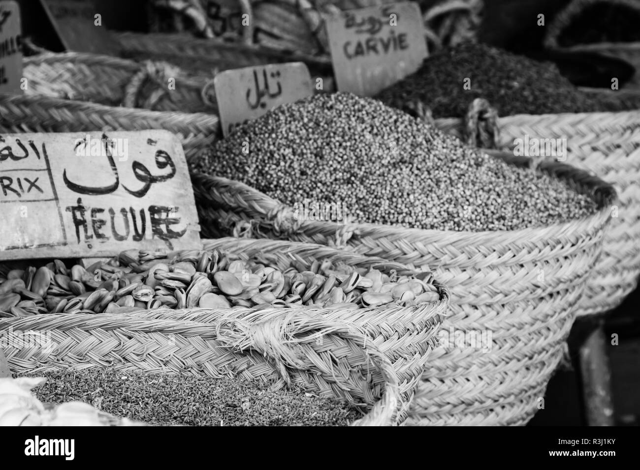 beautiful vivid oriental market with baskets full of various spices Stock Photo