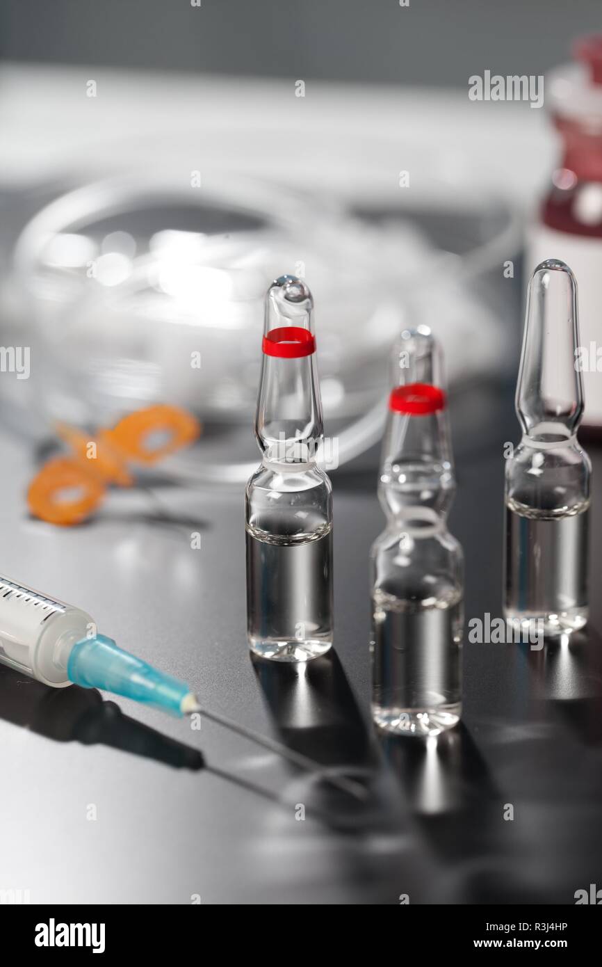 medical ampoules and syringes. vials of medication. Stock Photo