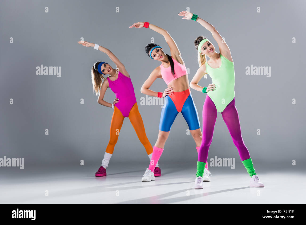 Beautiful Athletic Women 80S Style Sportswear Posing Together Grey Stock  Photo by ©EdZbarzhyvetsky 223180692