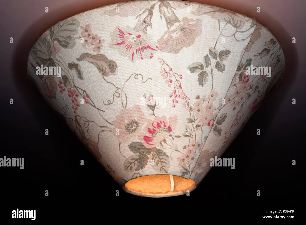 Light shade covered with Laura Ashley wallpaper Stock Photo