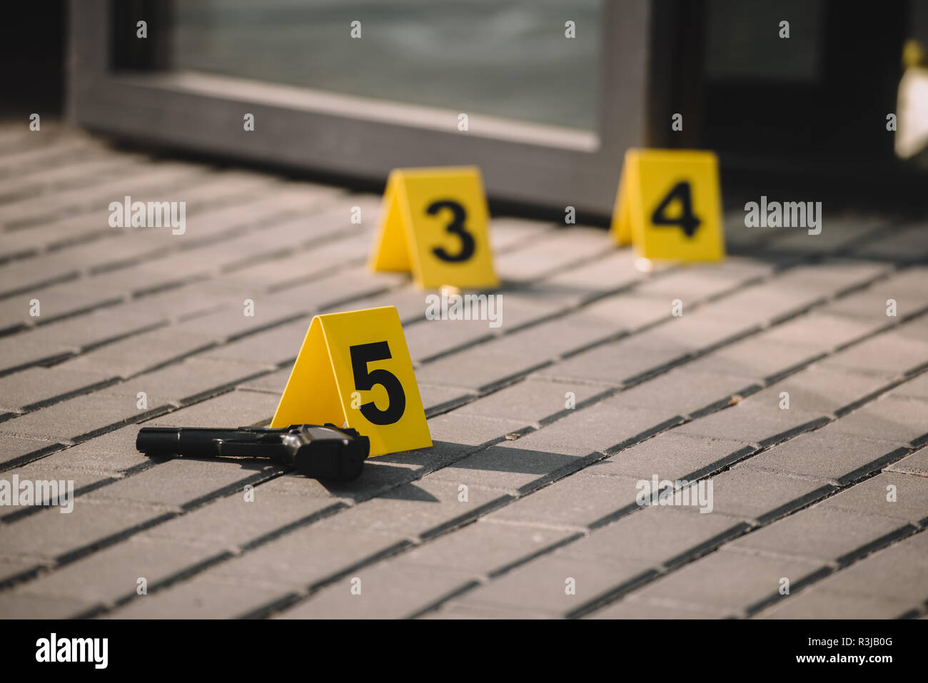 Close Up View Of Crime Scene With Gun And Numbers Stock Photo Alamy