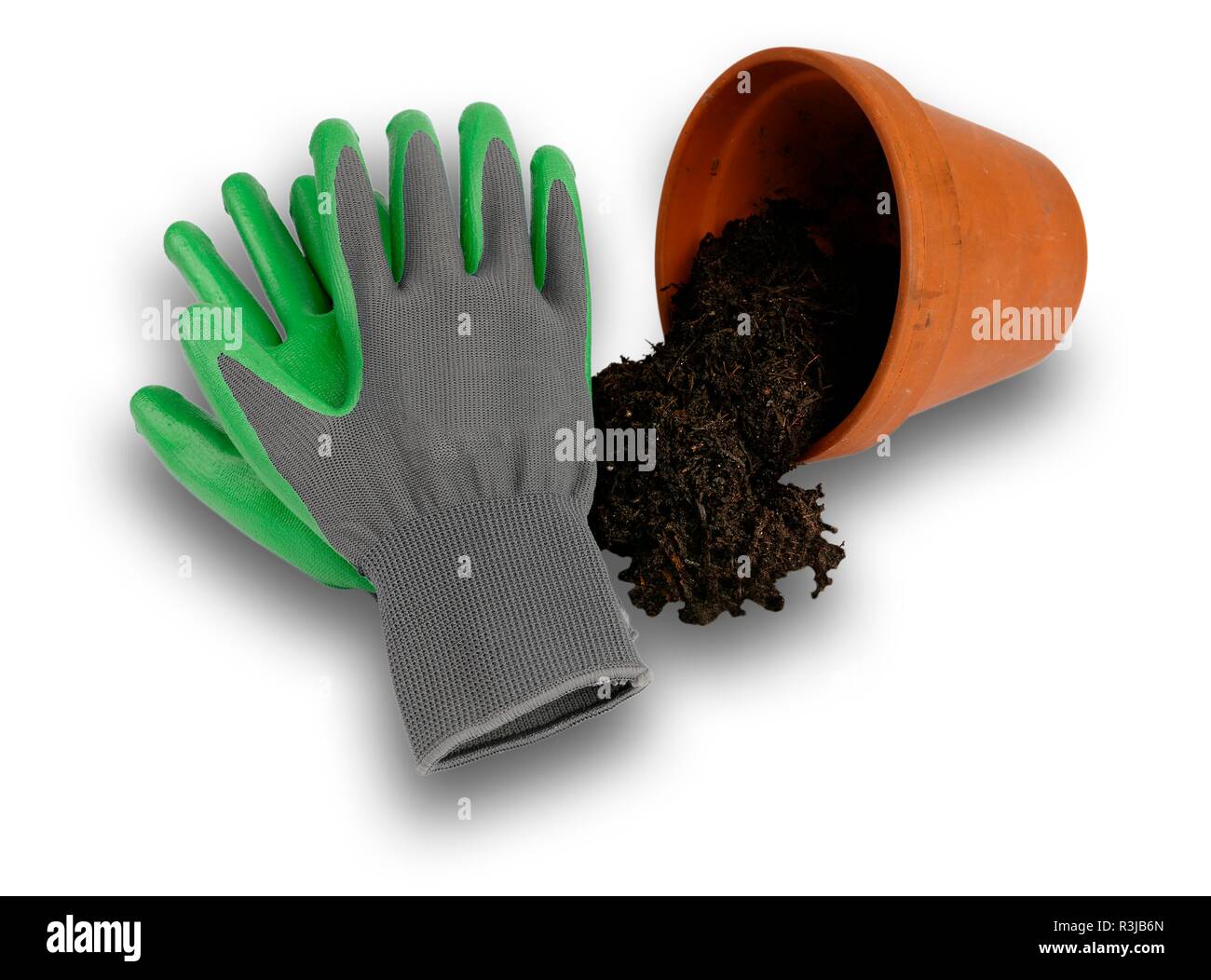 Isolated image of a pair of gardening gloves and a flower pot and compost, with a drop shadow. Stock Photo