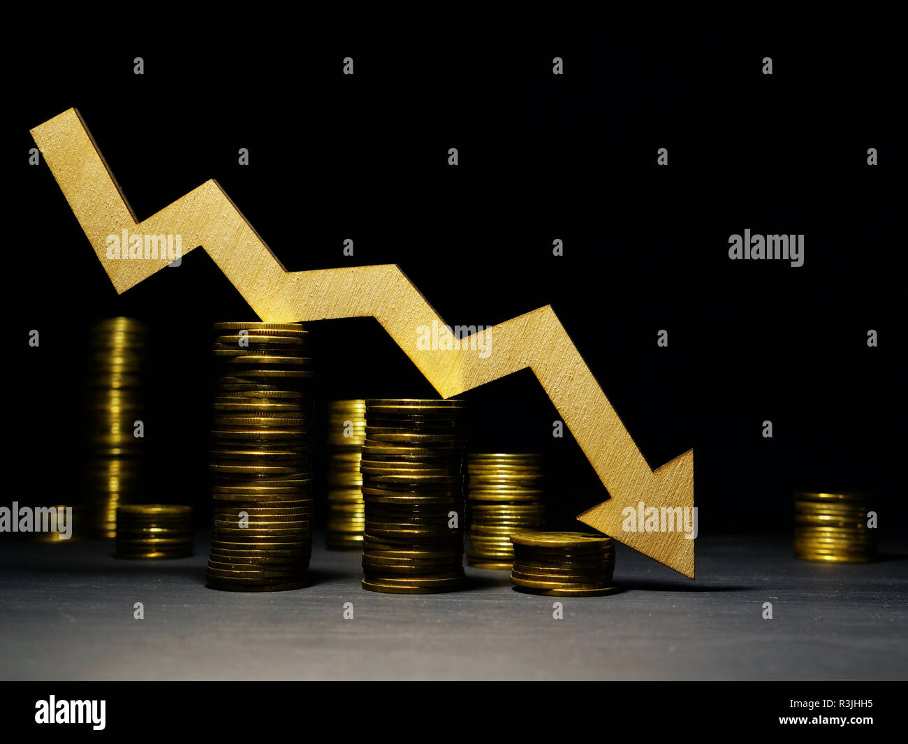 Market crisis concept. Falling arrow and money. Down of prices in a stock market. Stock Photo