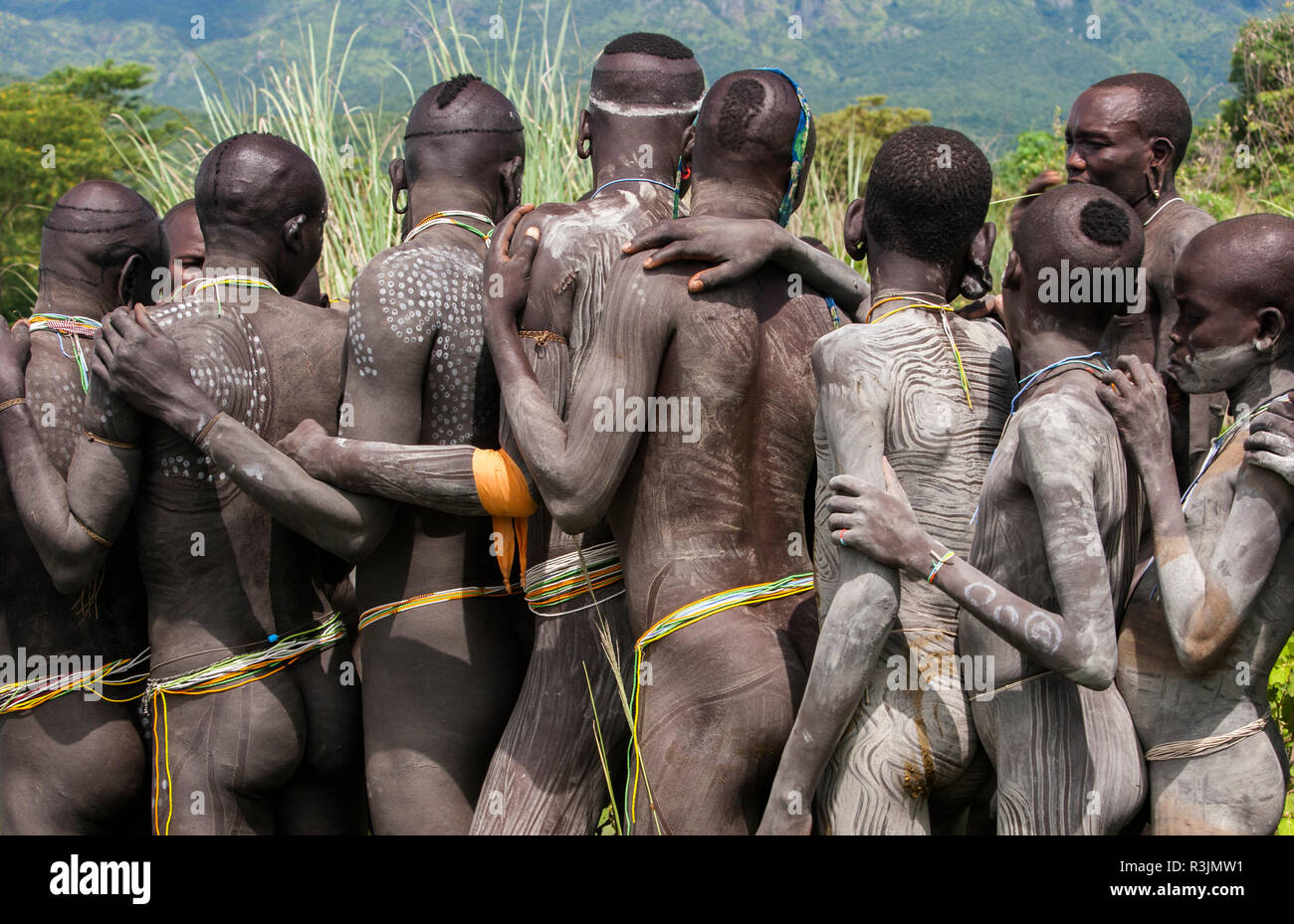 Surma tribesmen preparing for 'Donga,' a traditional stick fighting event, Omo River Valley, Ethiopia. Stock Photo