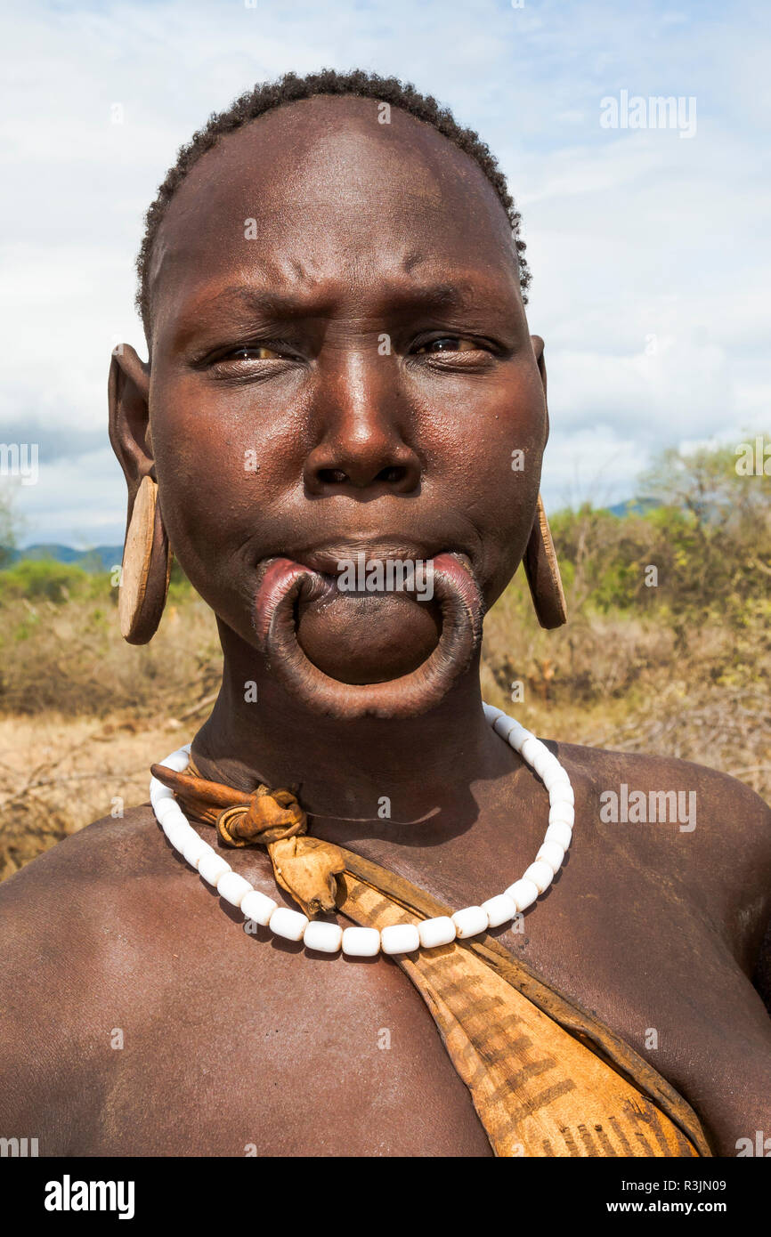 Stretched lip hi-res stock photography and images - Alamy