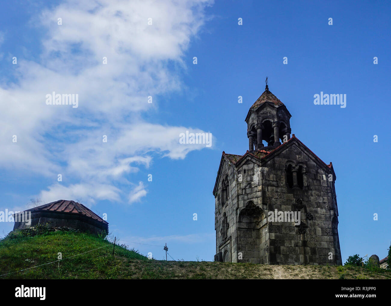 Haghpatavank Monastery Bell Tower on Hill in Summer with Blue Sky Stock Photo