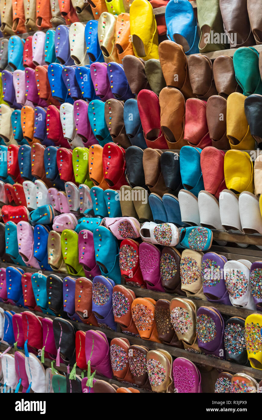 Traditional Moroccan slippers (babouches) on display in Marrakech markets, Marrakesh, Morocco Stock Photo