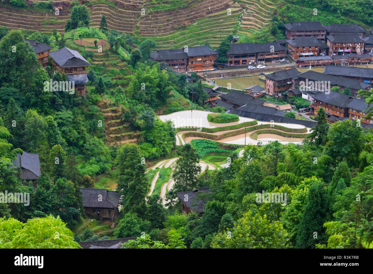 Village houses and rice terraces in the mountain, Dazhai, Guangxi Province, China Stock Photo