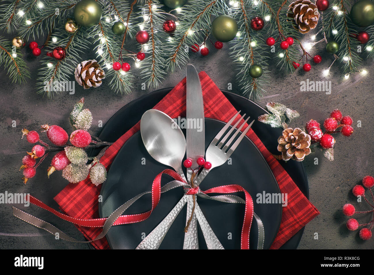 Christmas table setup on dark background. Flat lay with Xmas ...