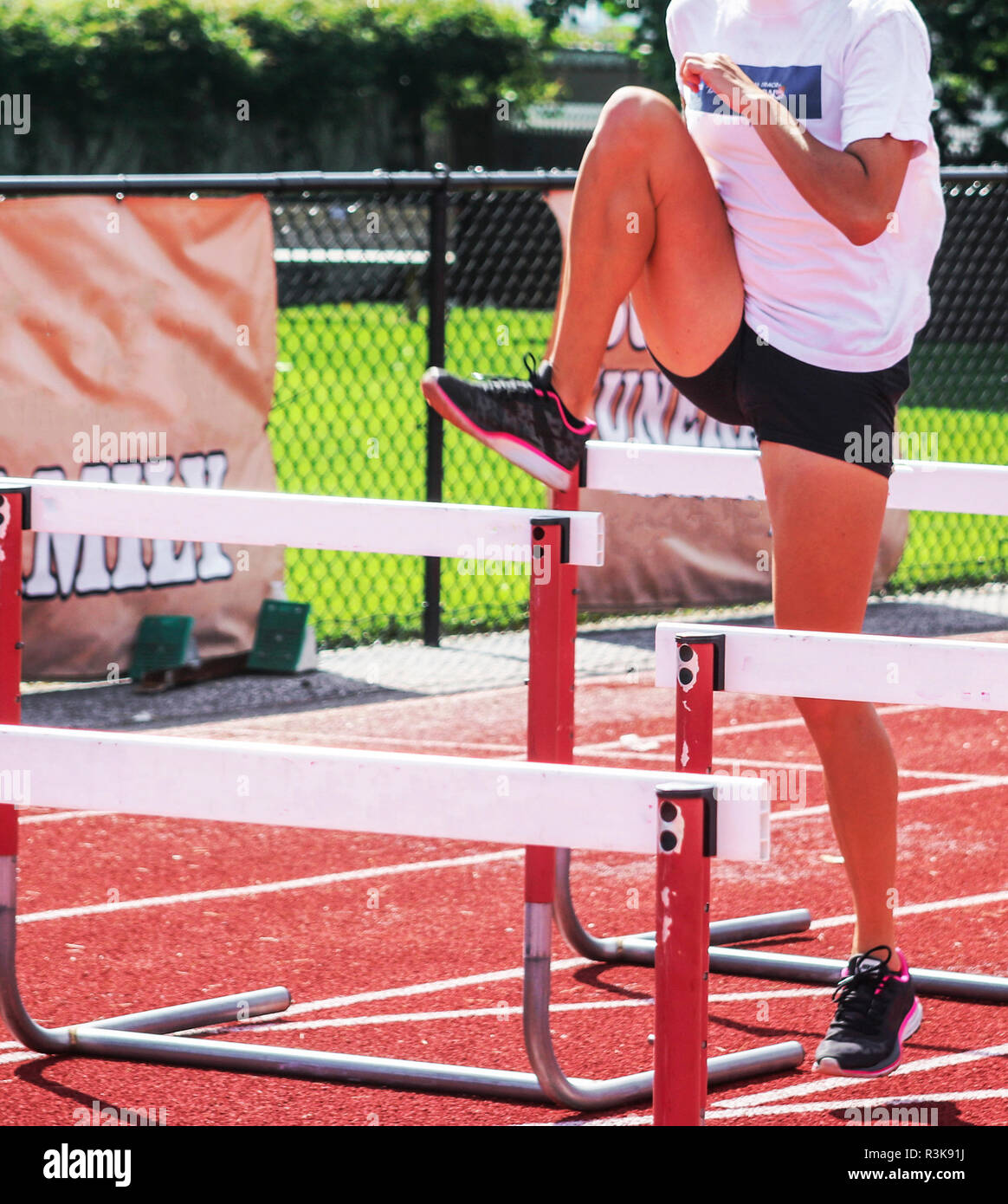 Running Over Hurdles High Resolution Stock Photography and Images Alamy