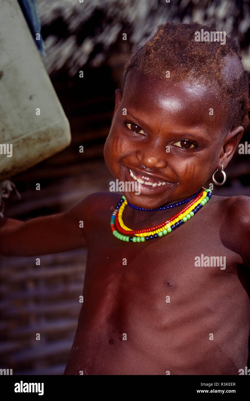 Young girl in the Bedik village called Damba or Dambakoi in Southeast Senegal. Sub-Saharan Africa, Senegal, Bedik, tribe, Dambakoi village. (MR) Stock Photo