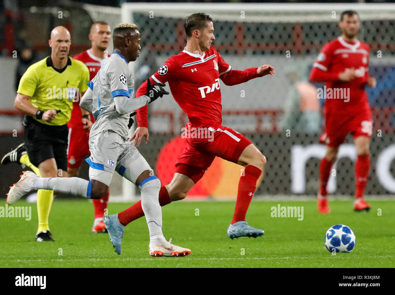 MOSCOW, RUSSIA - OCTOBER 03: Aleksei Miranchuk (C) of FC Lokomotiv Moscow and Hamza Mendyl (L) of FC Schalke 04 vie for the ball during the Group D match of the UEFA Champions League between FC Lokomotiv Moscow and FC Schalke 04 at Lokomotiv Stadium on October 3, 2018 in Moscow, Russia. (MB Media) Stock Photo