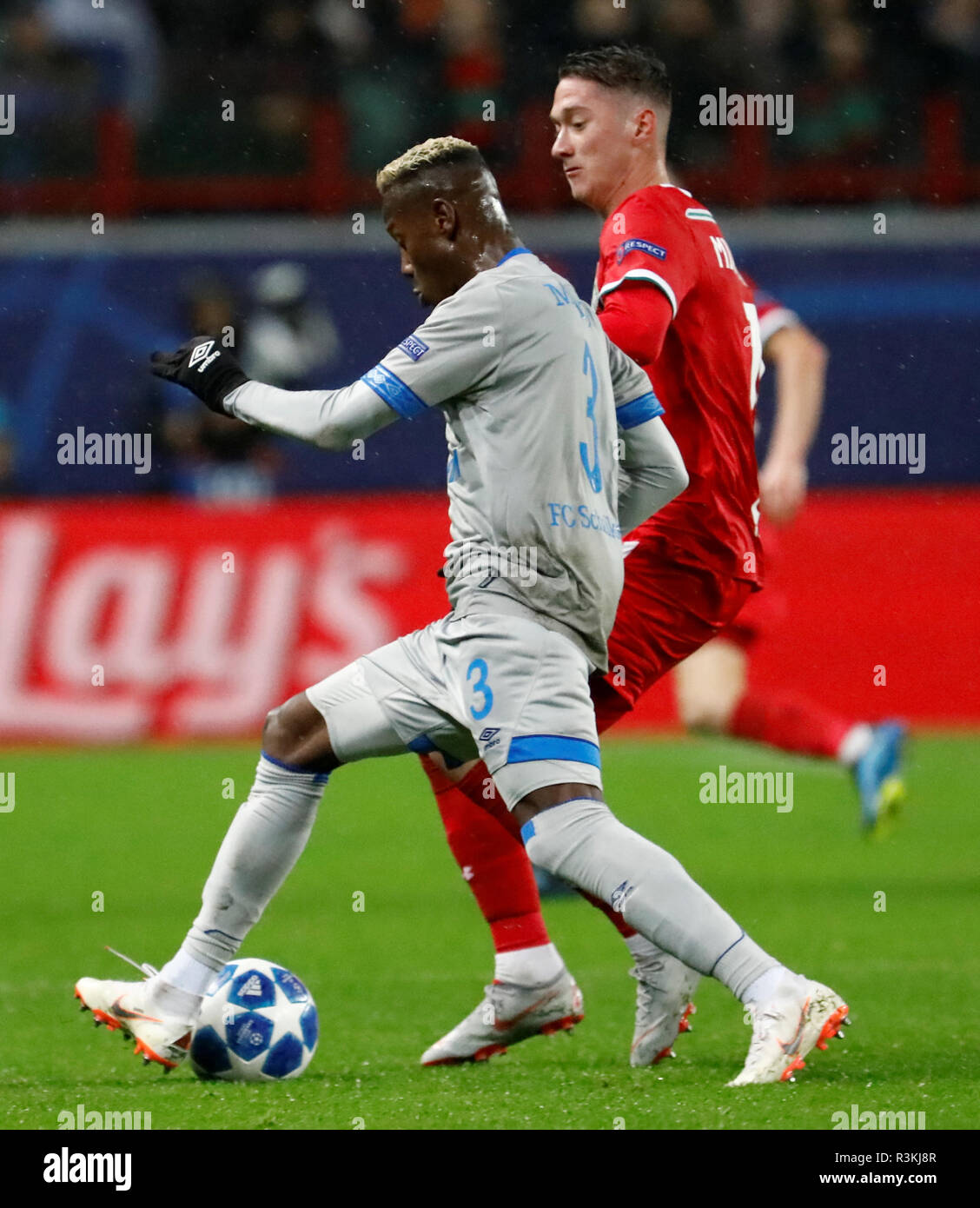 MOSCOW, RUSSIA - OCTOBER 03: Anton Miranchuk (R) of FC Lokomotiv Moscow and Hamza Mendyl of FC Schalke 04 vie for the ball during the Group D match of the UEFA Champions League between FC Lokomotiv Moscow and FC Schalke 04 at Lokomotiv Stadium on October 3, 2018 in Moscow, Russia. (MB Media) Stock Photo
