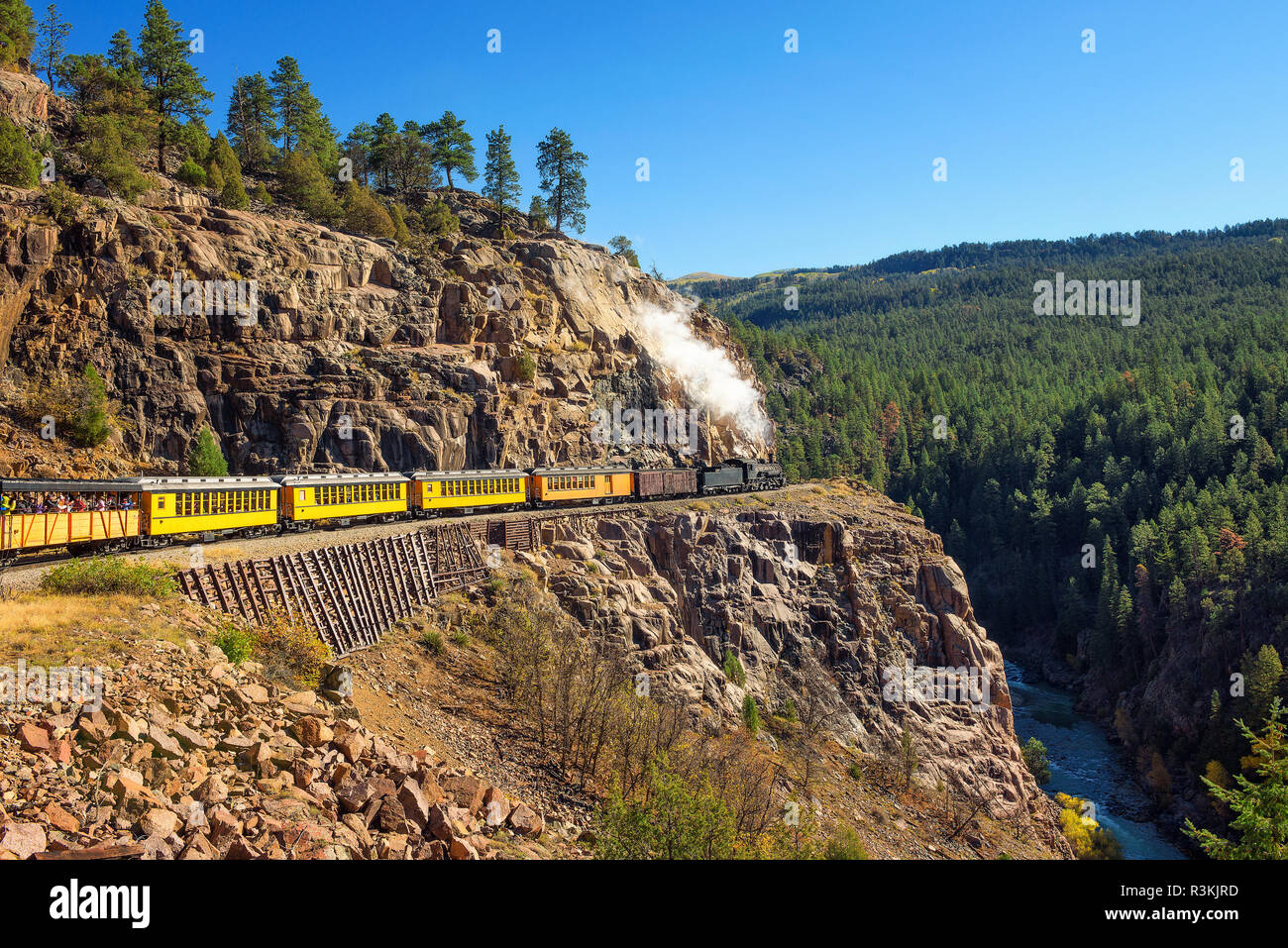 Historic steam engine train travels from Durango to Silverton through the San Juan Mountains in Colorado, USA. Stock Photo