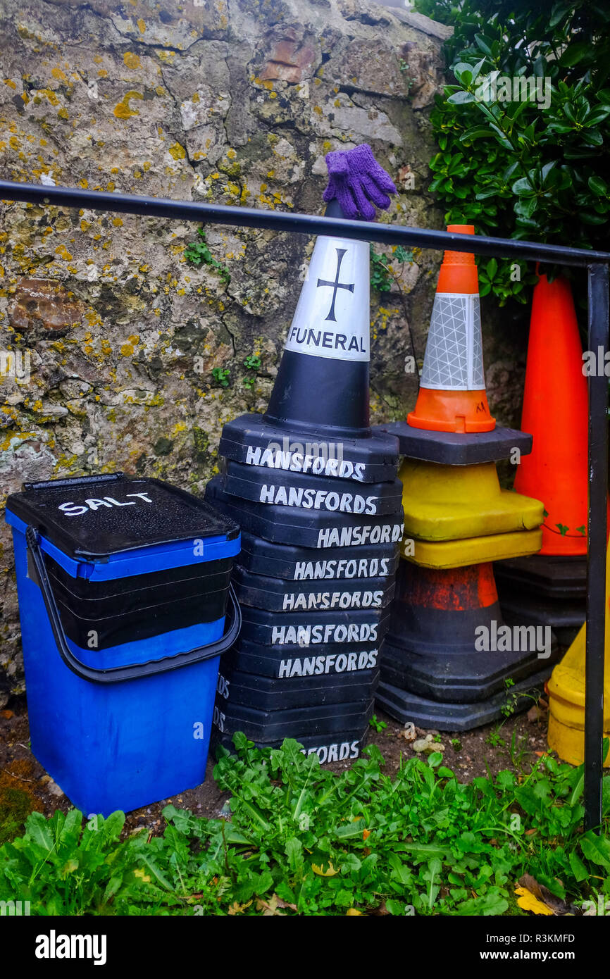 Hansfords funeral directors parking cones at the St Winifreds  church at Branscpmbe village in East Devon UK Stock Photo