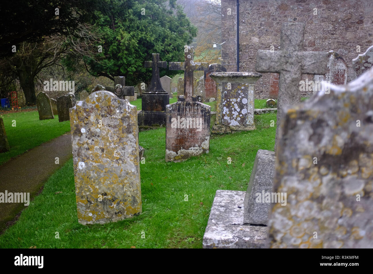 Graveyard at the St Winifreds Church at Branscpmbe village in East Devon UK Stock Photo