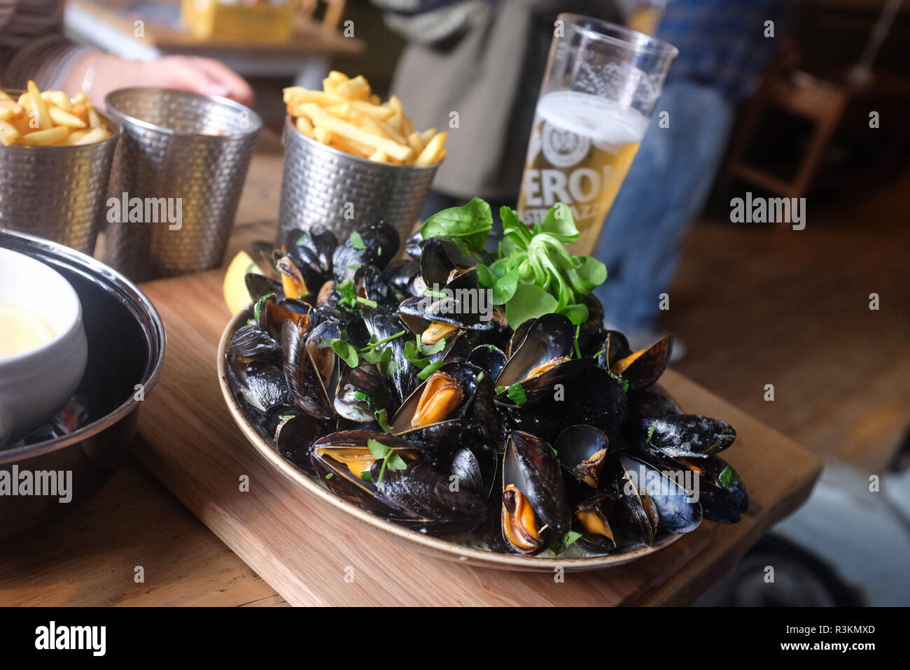 Bowl of mussels for lunch in The Cobb Arms Lyme Regis West Dorset UK