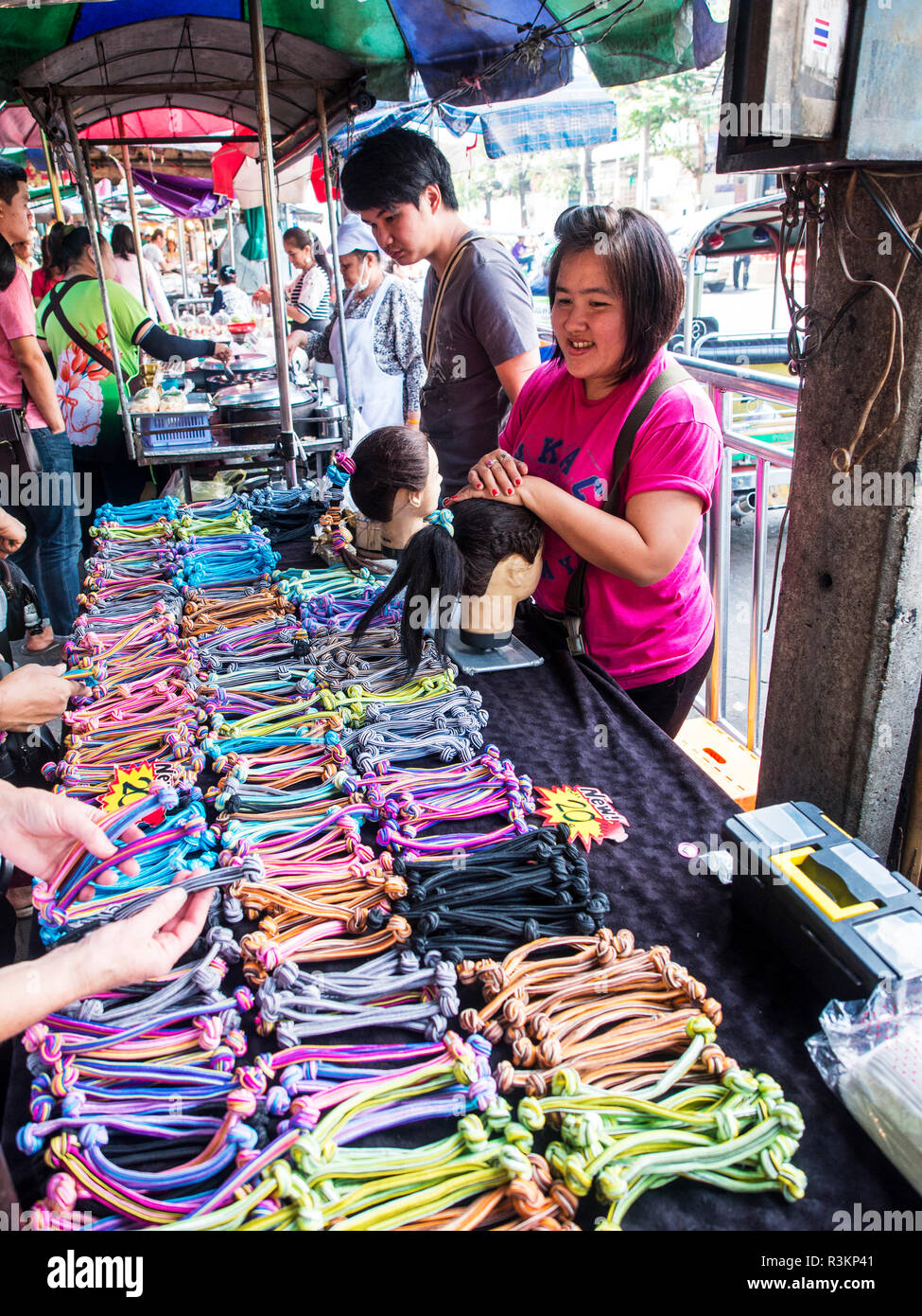 Thailand, Bangkok, Bangkok, Market, Sidewalk vendor of hair ties Stock Photo