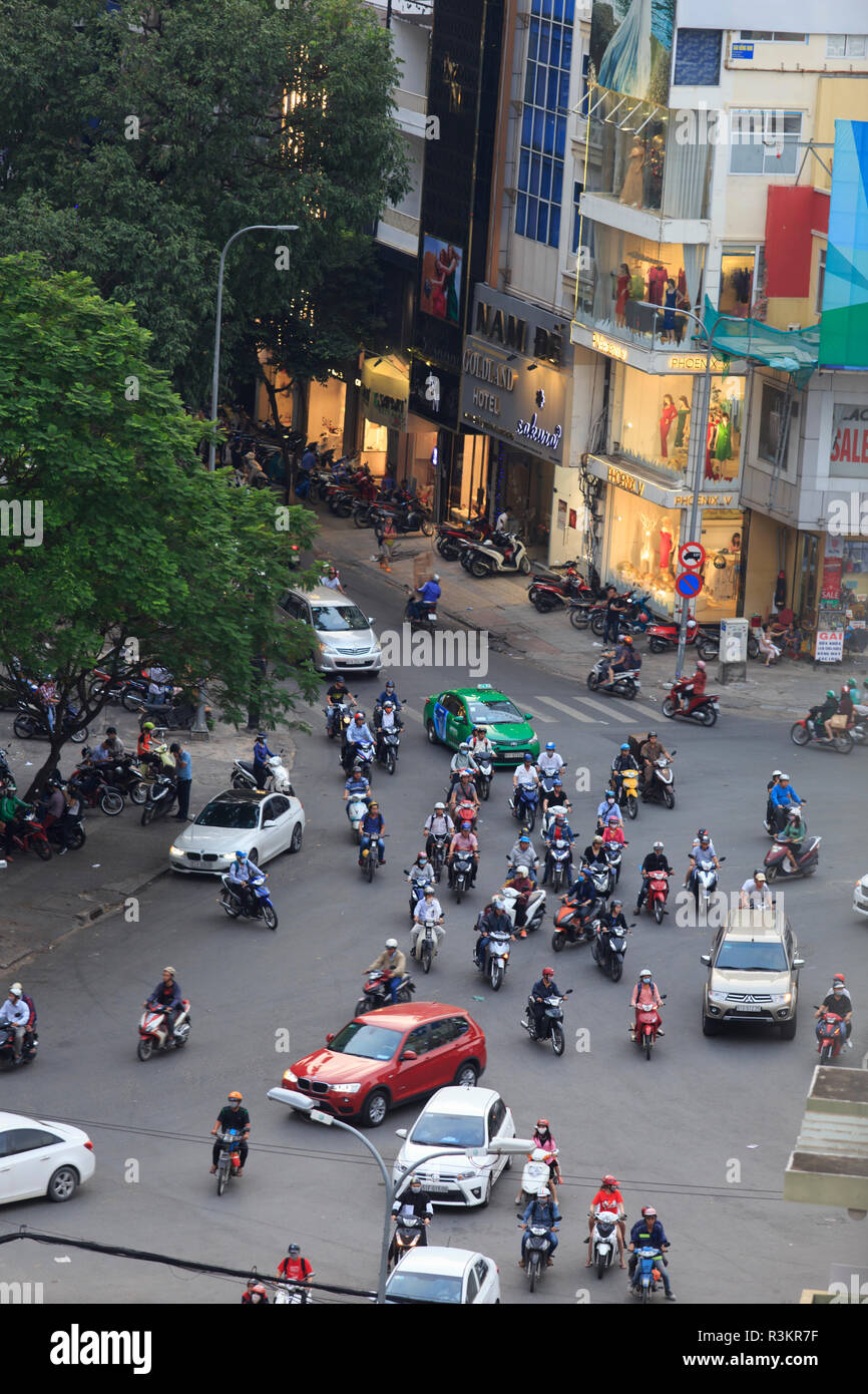 Crazy traffic at a crowded intersection in District 1 of Ho Chi Minh City,  Vietnam Stock Photo - Alamy, image size:866x1390