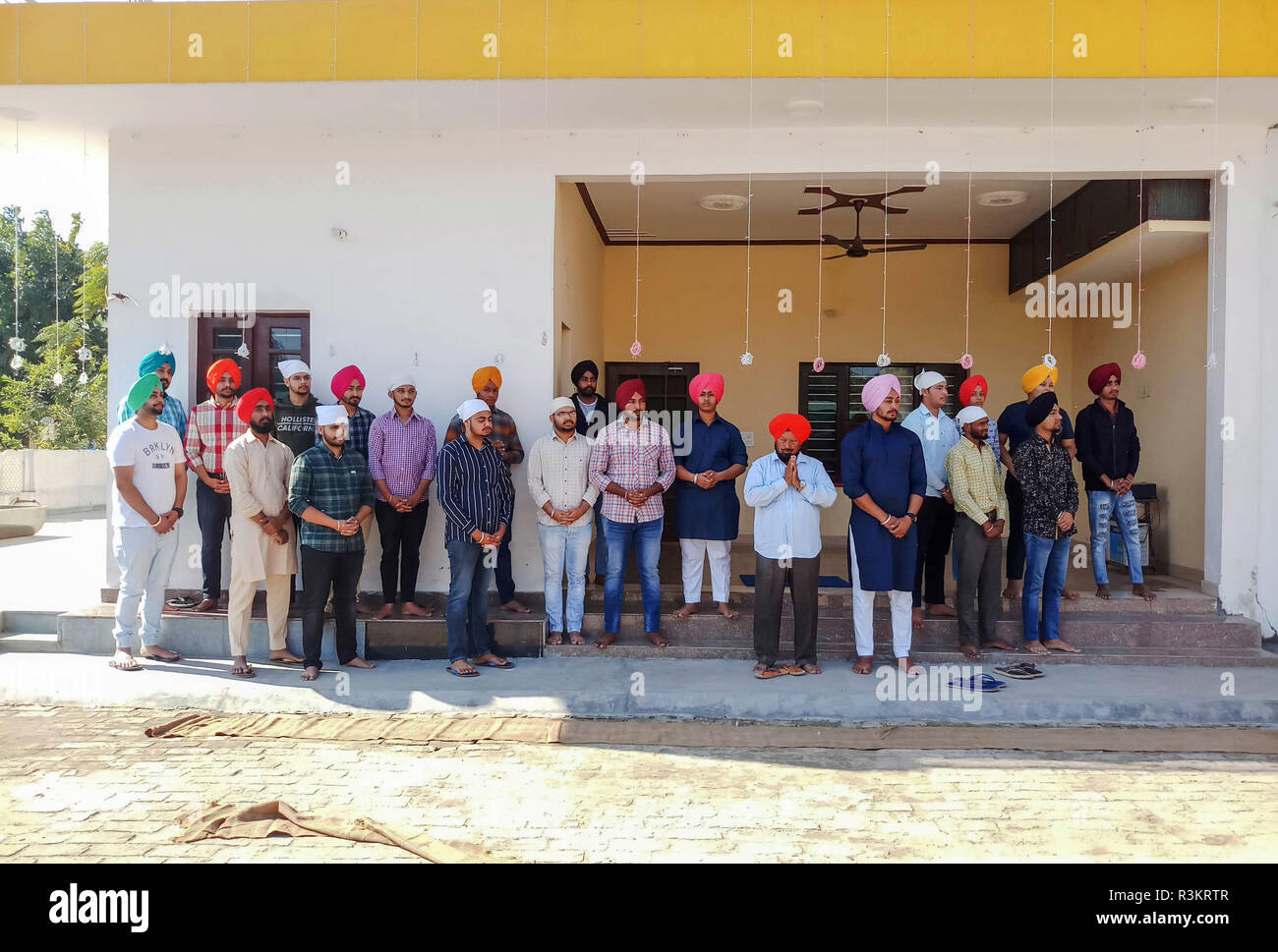 Mohali, Punjab, India. 23rd Nov, 2018. Sikh pilgrims are seen attending rituals during the occasion of the 550th birth anniversary of Guru Nanak Dev in Mohali.Sikhism was founded in the 15th century by Guru Nanak, who broke away from Hinduism, India's dominant religion, He preached the equality of races and genders and the rejection of image-worship and the caste system. Credit: Saqib Majeed/SOPA Images/ZUMA Wire/Alamy Live News Stock Photo