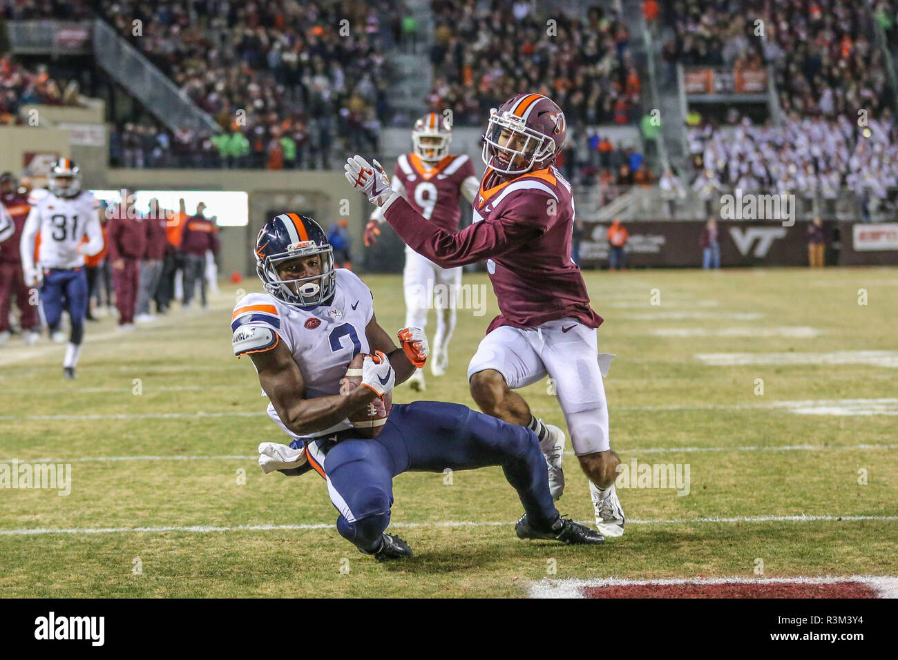 Blacksburg, VA, USA. 23rd Nov, 2018. Virginia Cavaliers wide receiver Joe Reed (2) catches a touchdown pass during NCAA football action between the Virginia Cavaliers and the Virginia Tech Hokies at Lane Stadium in Blacksburg, VA. Jonathan Huff/CSM/Alamy Live News Stock Photo