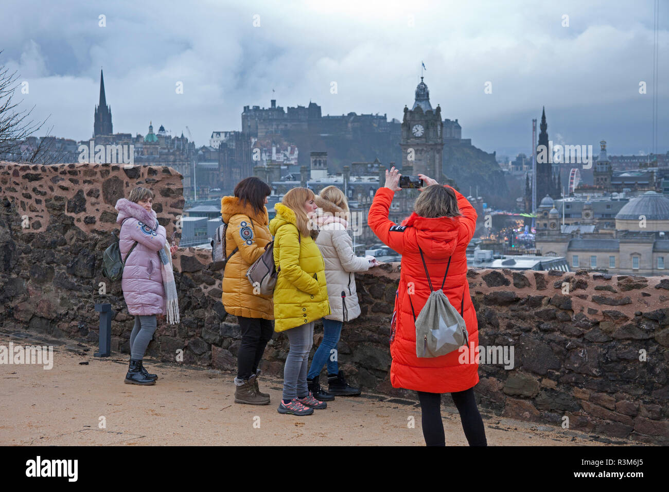 Edinburgh, Scotland, UK, 24 Nov. 2018. Weather, after a very wet week in the Scottish capital, Saturday began in a similar vein greeting these tourists and residents alike with early heavy rain and leaden skies. Stock Photo