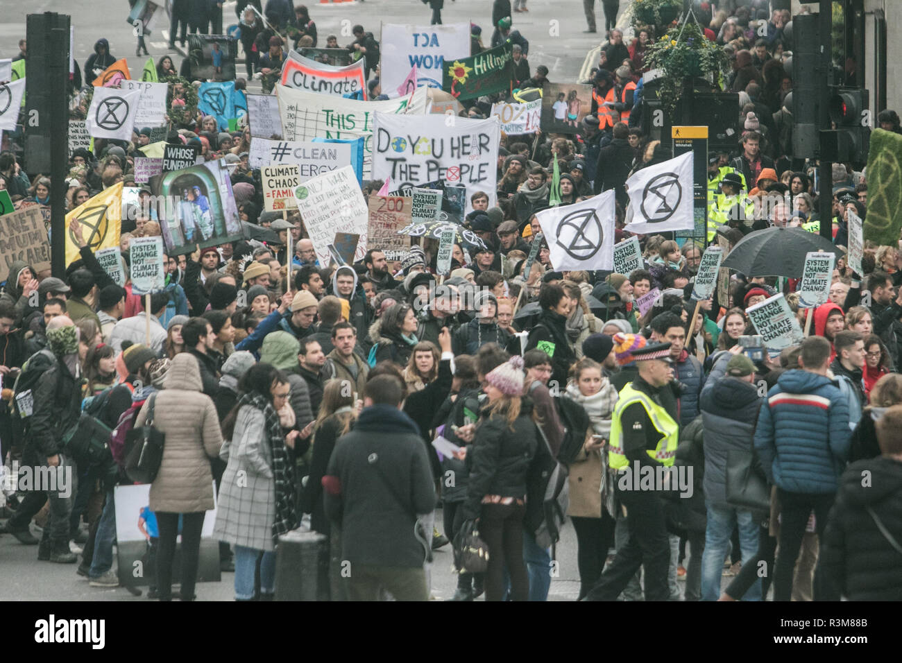London UK. 24th November 2018. Hundreds of climate change activists from Extinction Rebellion continue their protest as they marched  through Whitehall aimed at highlighting the government’s failure to recognise and act on the ecological and climate emergency Credit: amer ghazzal/Alamy Live News Stock Photo