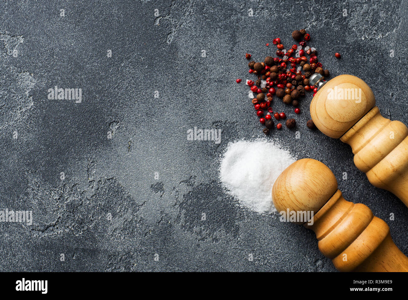 Salt and pepper mixture on a dark table with a copy of the space Stock Photo Alamy