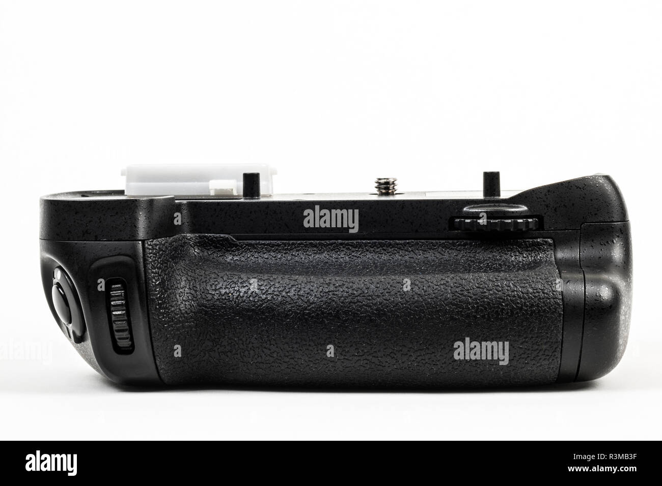 DSLR camera battery grip color black isolated in white. Front view. Stock Photo