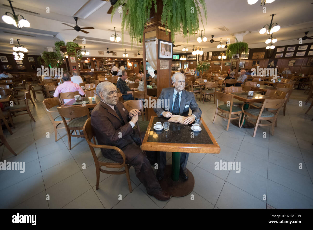 Buenos Aires, Argentina - February 8 2015: Statues of to popular writers in Latin Amercia sitting in La biela, Recoleta, Buenos Aires city. Stock Photo