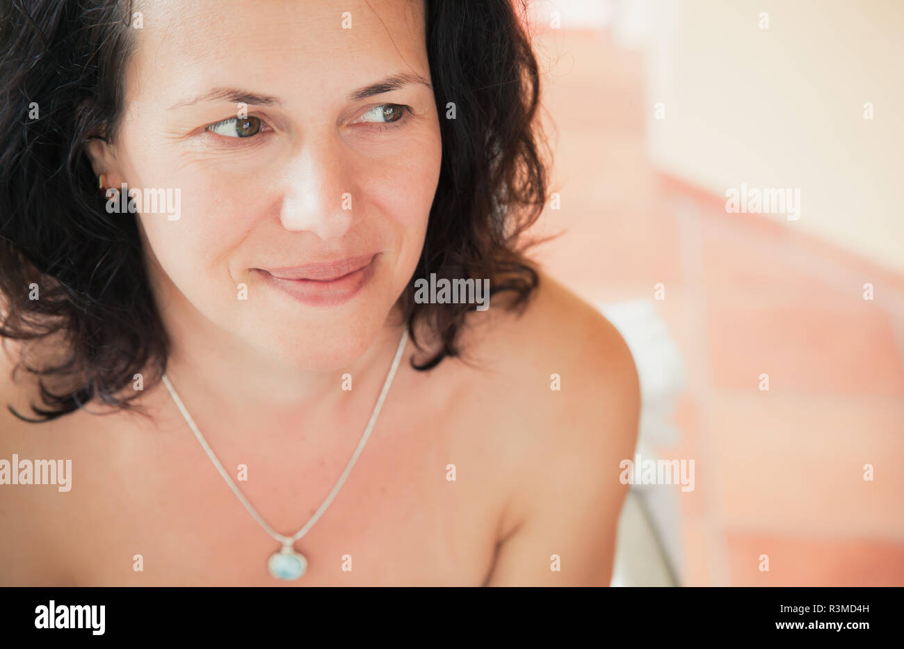 Positive smiling young adult Caucasian woman, close-up face portrait Stock Photo