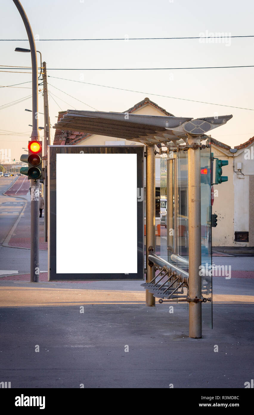 Vertical Bus Vertical bus stop advertisement mockup near red traffic light. Copy ...