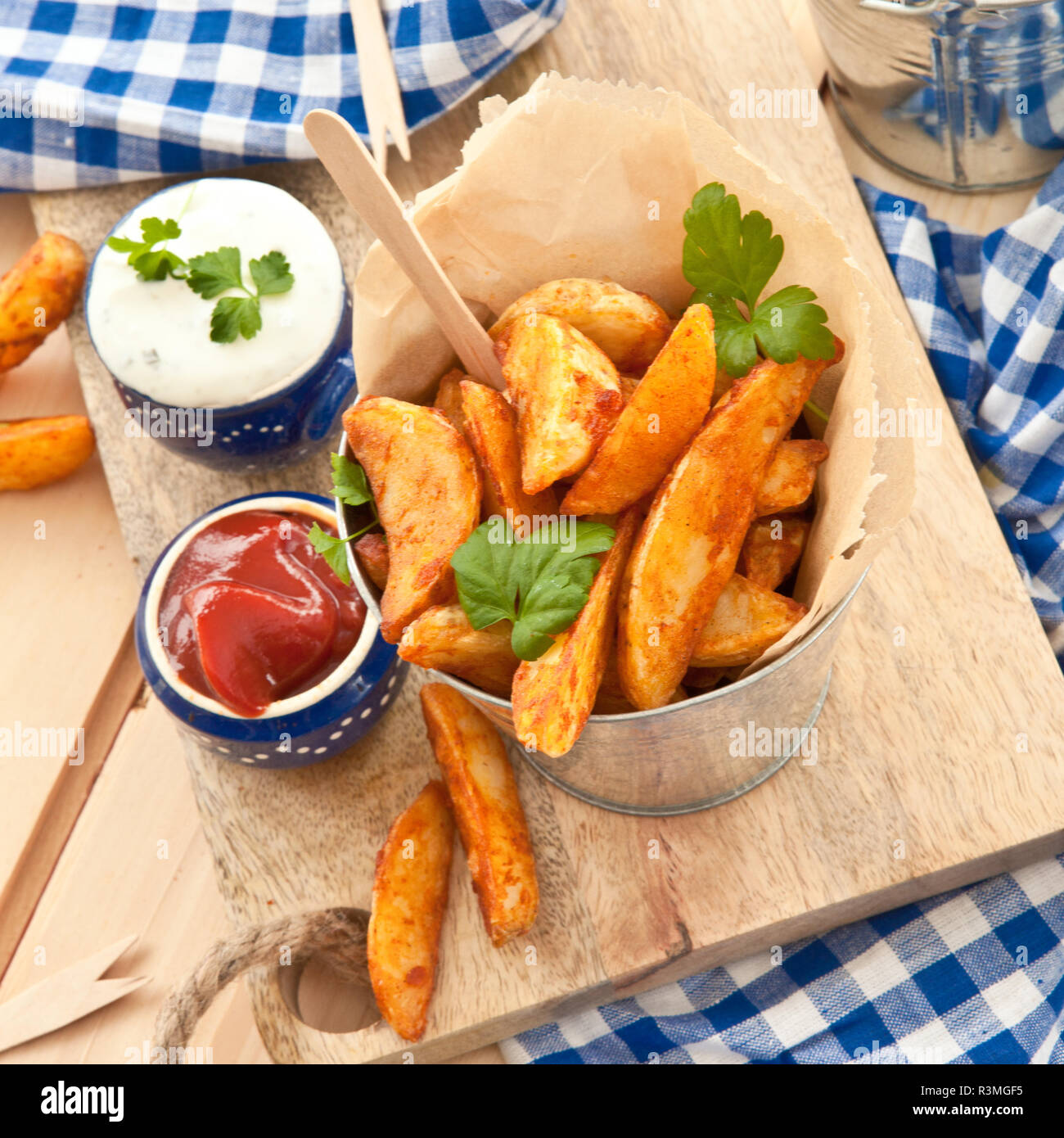 fresh potato wedges with dip Stock Photo Alamy