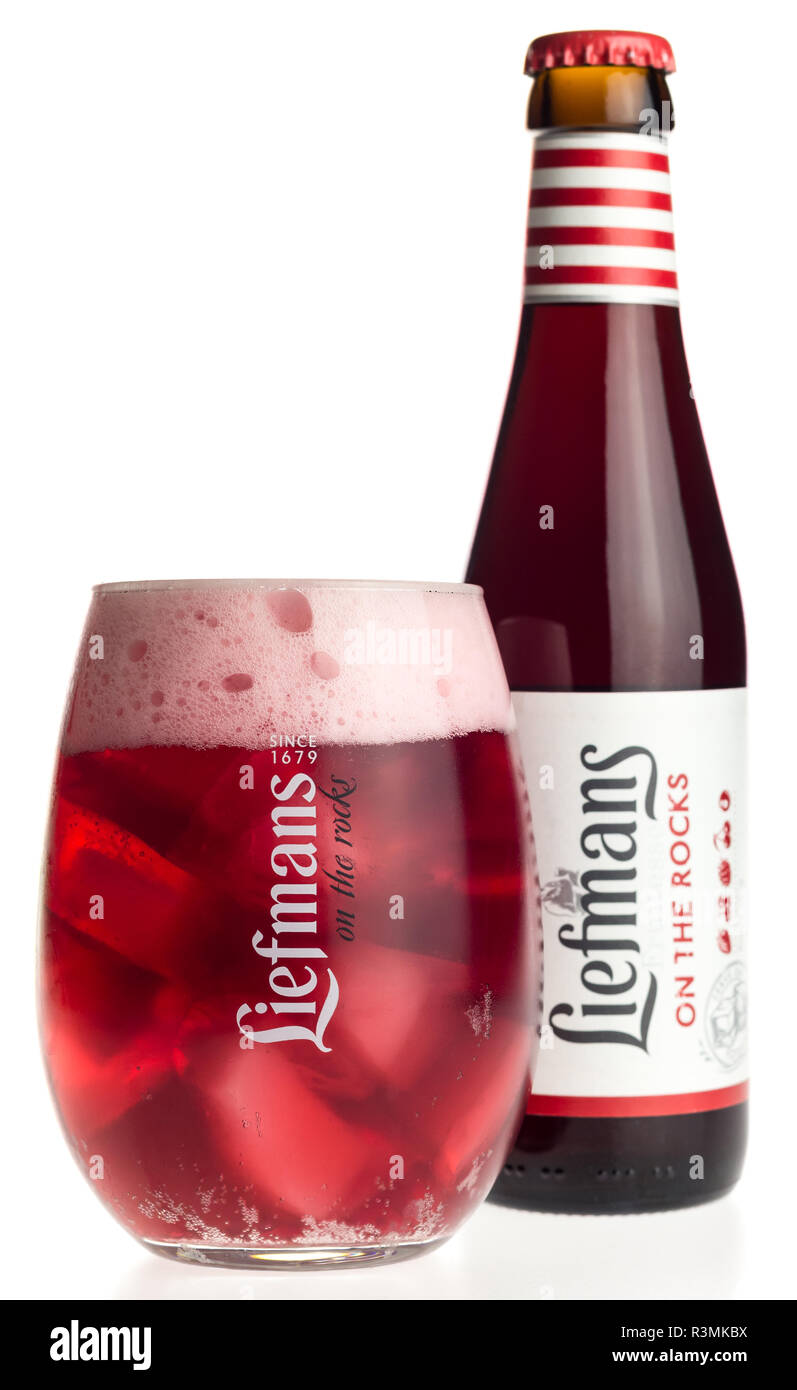 Bottle and glass of Belgian Liefmans Fruitesse fruit beer isolated on a