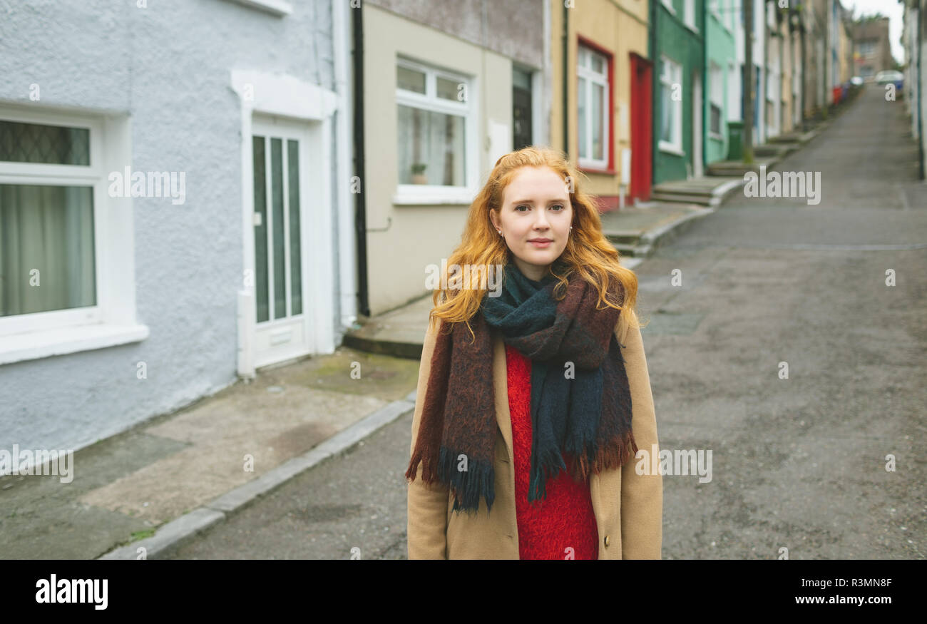 Woman standing on the street hi-res stock photography and images - Alamy