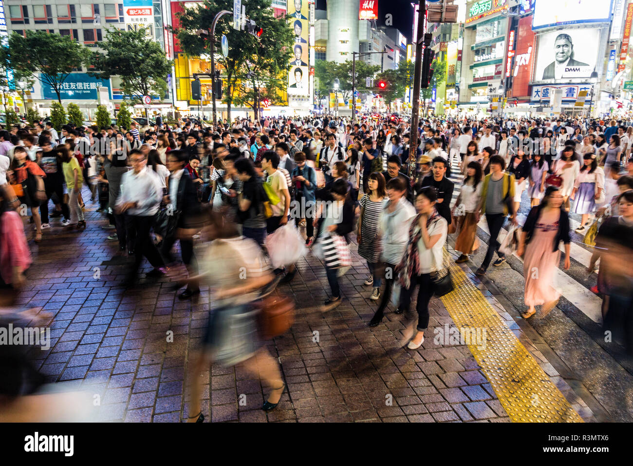 Tokyo, Japan. Pedestrian crossing in Shibuya District in the evening
