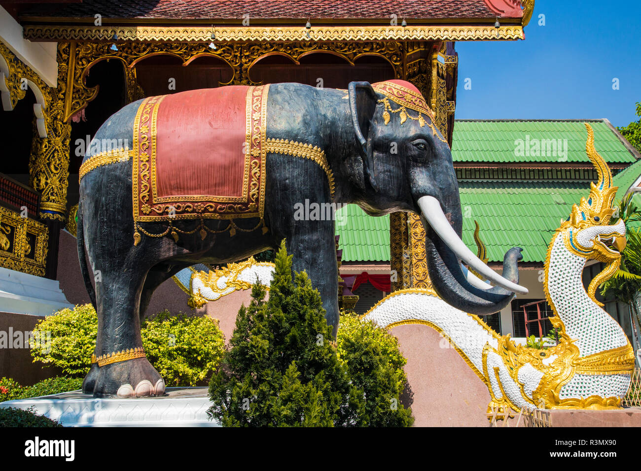 Chiang Mai, Thailand. Statues of royal elephants and naga serpents