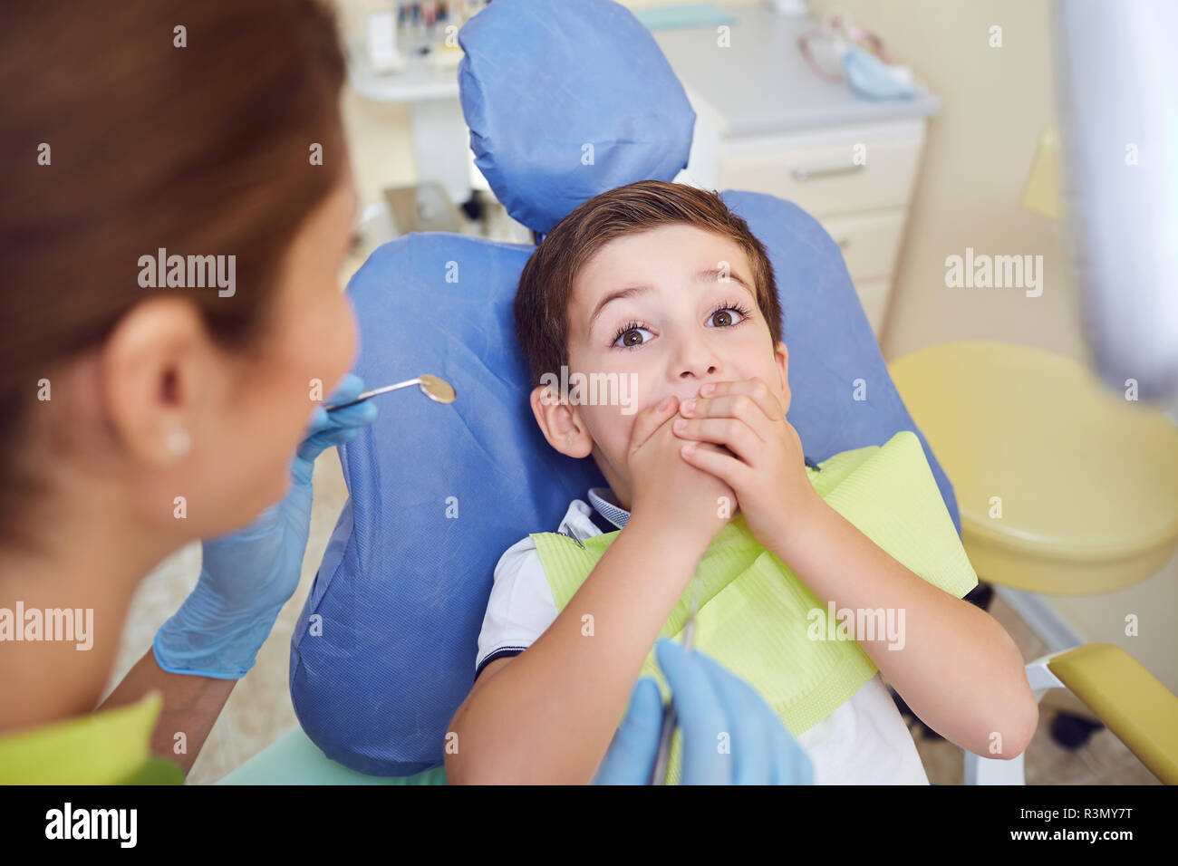 Frightened child boy in dental clinic.  Stock Photo