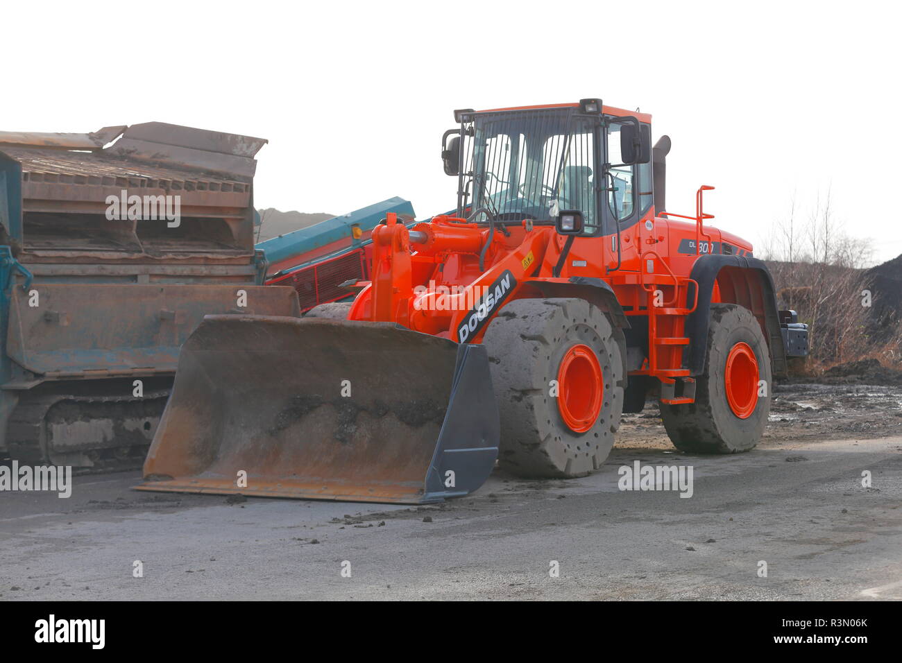 A Doosan DL300 wheeled loader on the demolition of Recycoal, Coal Recycling Plant in Rossington,Doncaster. Stock Photo