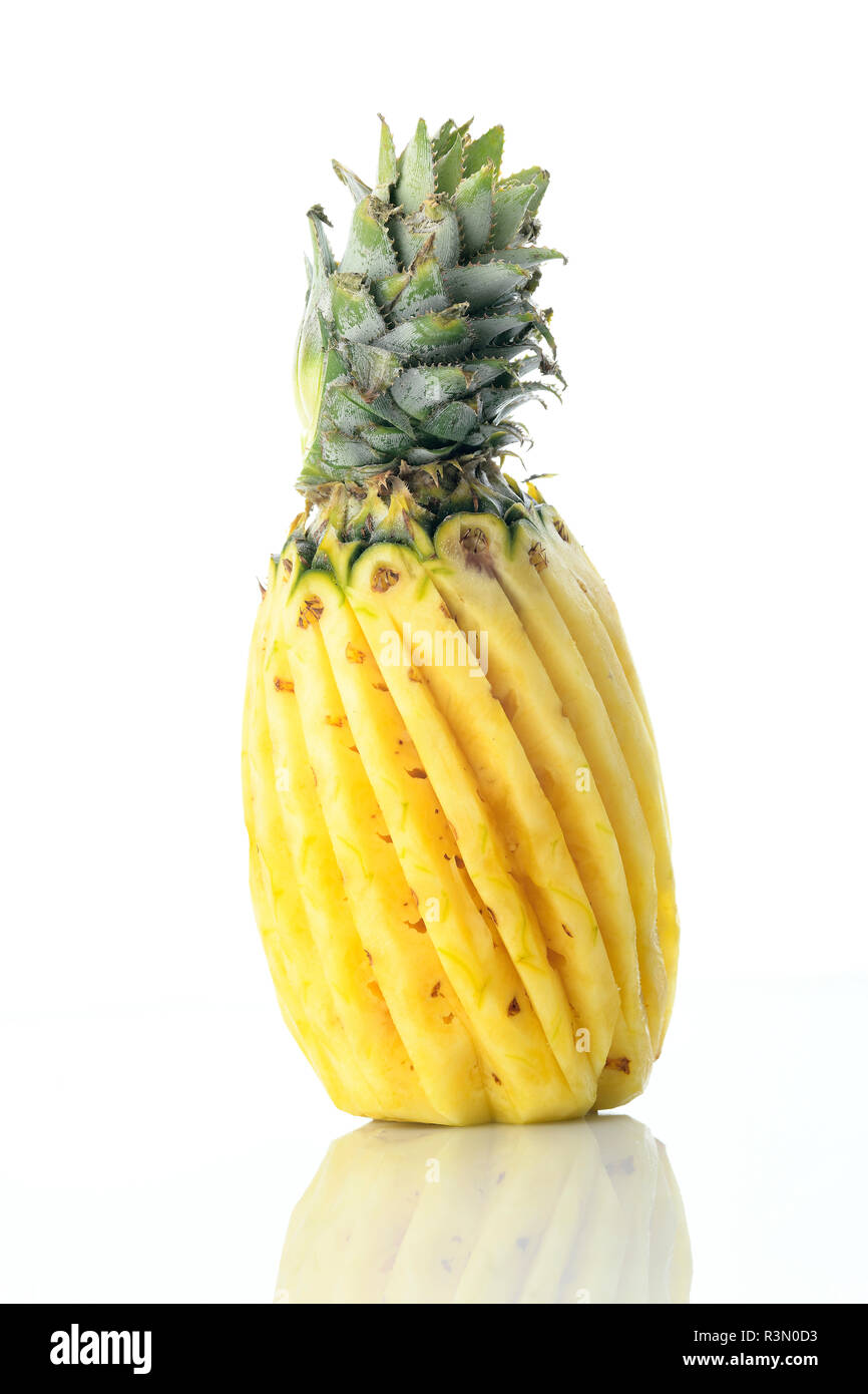 Fruit: Fresh Peeled Pineapple Isolated on White Background Stock Photo