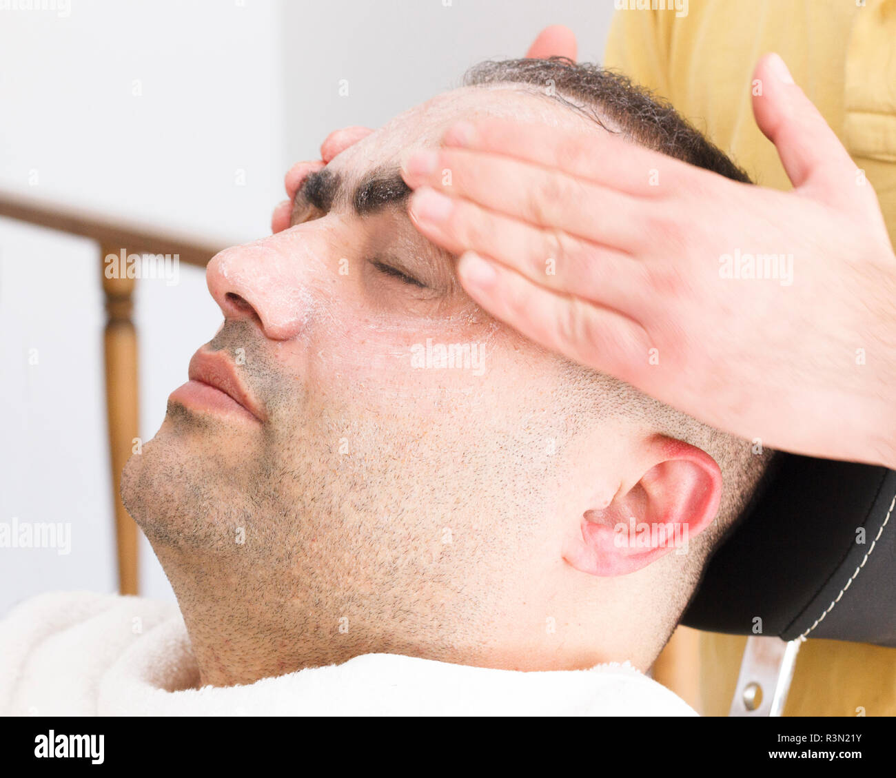 Facial massage for turkish man in barber shop Stock Photo Alamy