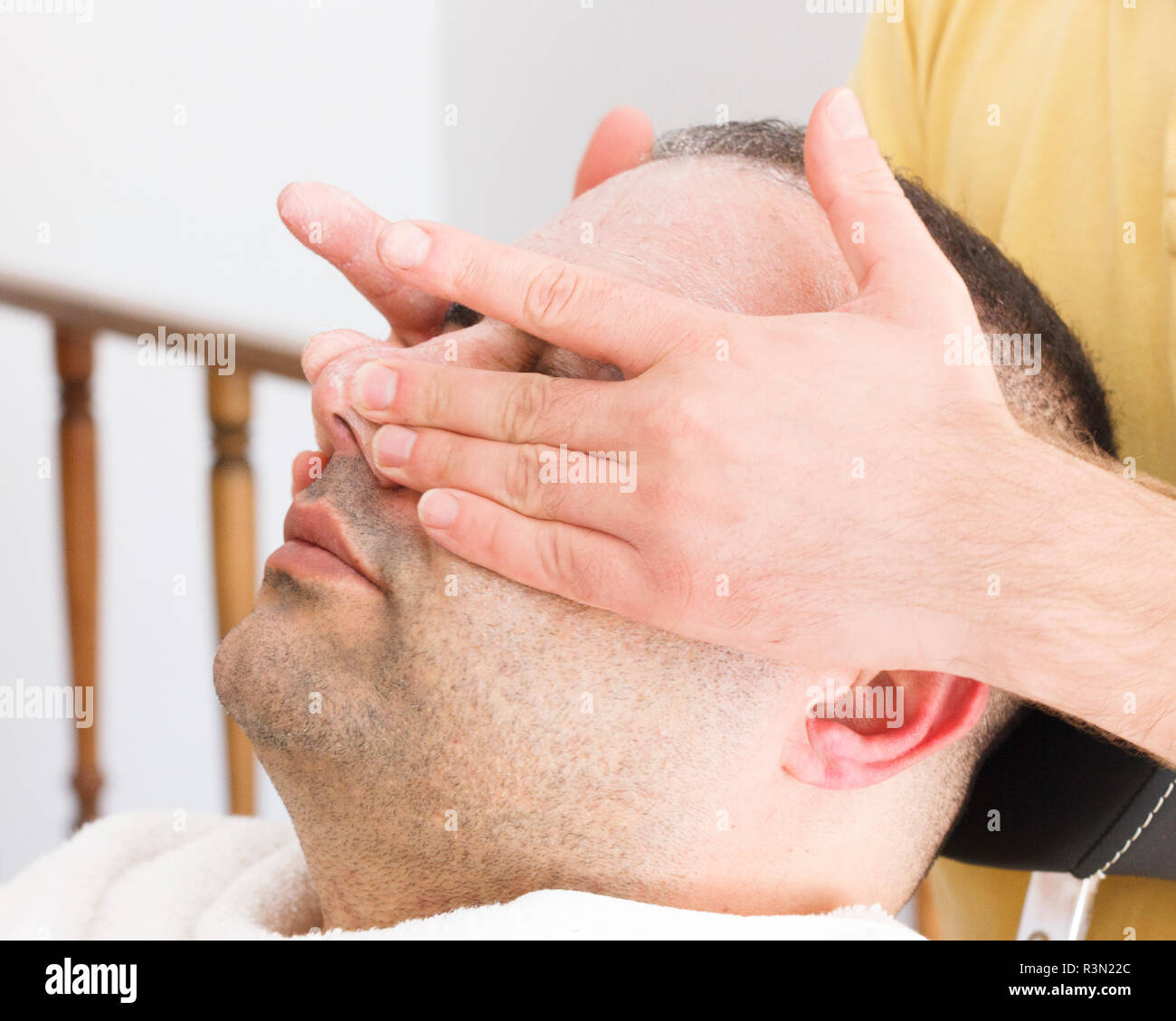 Facial massage for turkish man in barber shop Stock Photo Alamy
