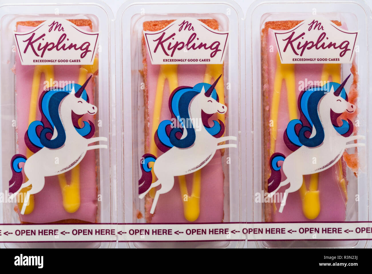 Pack of Mr Kipling Unicorn Slices exceedingly good cakes - individually wrapped, three 3 Stock Photo